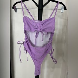 One piece purple bathing suit